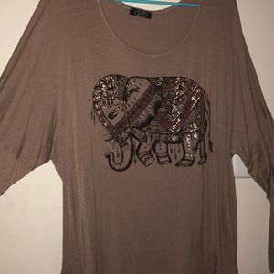 Tan light weight long sleeve shirt.